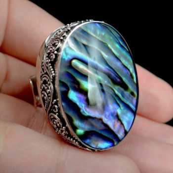 Zilveren ring met grote Abalone schelp bewerkte kop